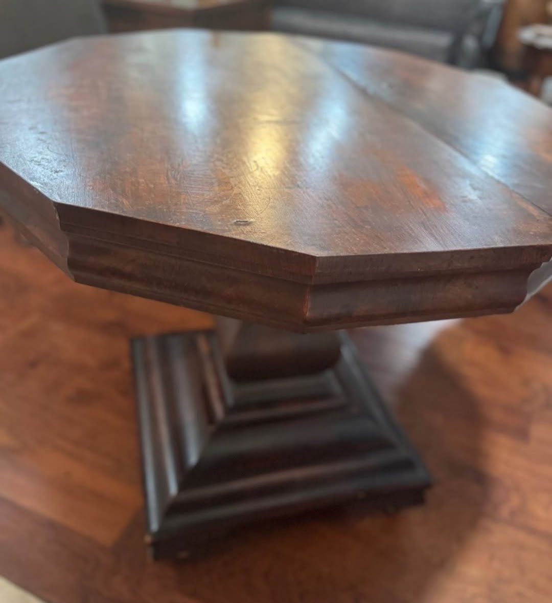 Octagonal Pedestal Table — Stepped pyramid base · moulded octagonal top · solid walnut